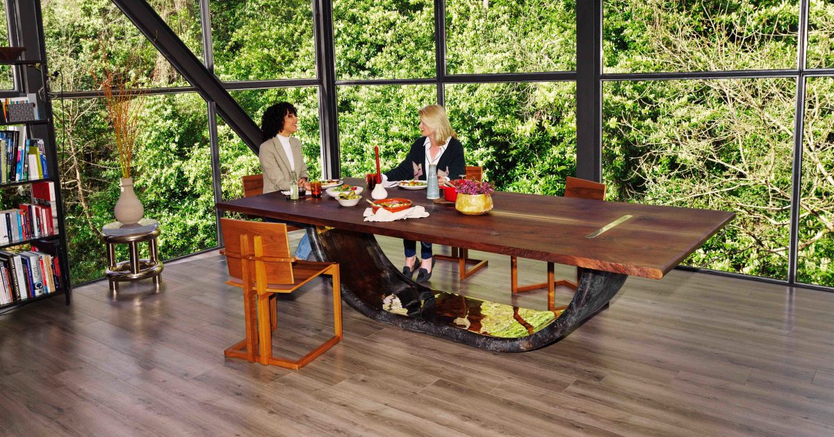 Onze Dining Table, juxtaposing bronze base texture